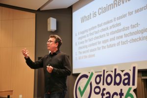 photo of Bill presenting at Global Fact